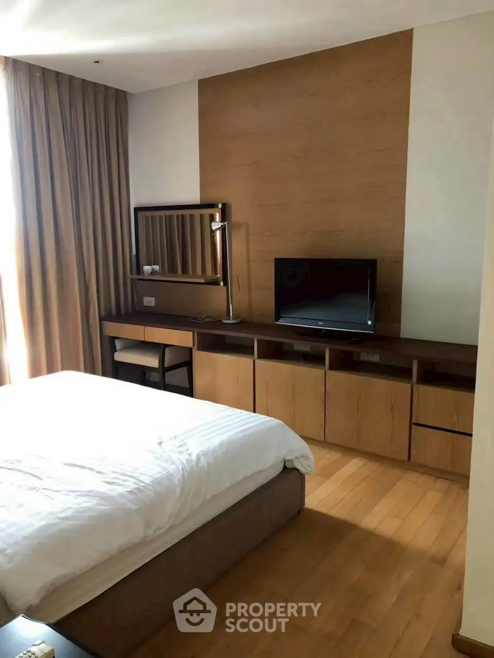 Cozy bedroom with modern decor and natural light