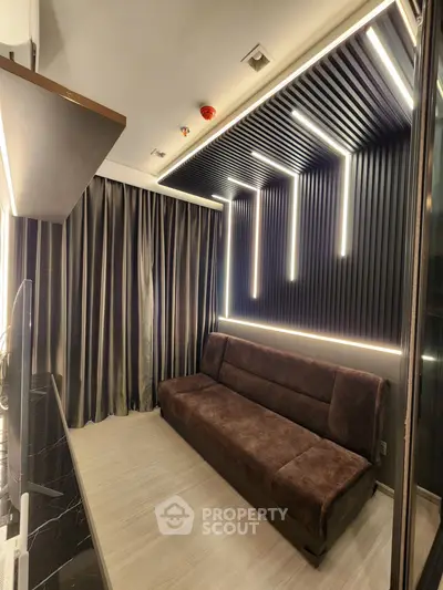 Modern living room with sleek lighting and dark curtains