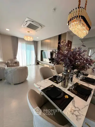 Luxurious modern living room with elegant dining area and stylish decor