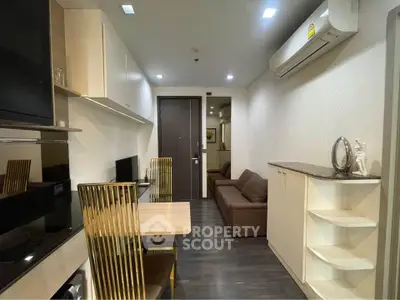 Modern apartment interior with sleek kitchen and cozy living area