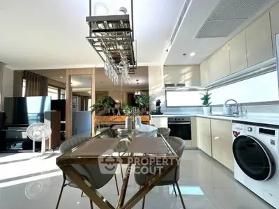 Luxurious modern kitchen with sleek appliances and elegant dining area