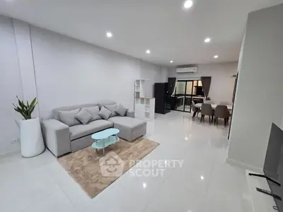 Spacious modern living room with elegant decor and open layout