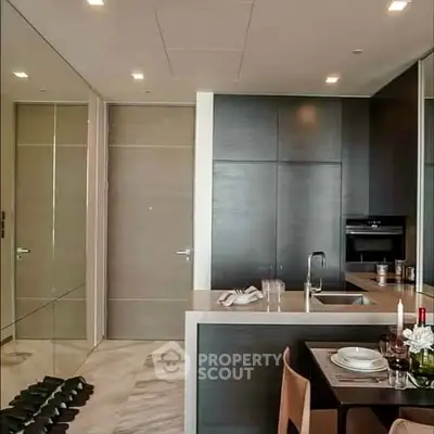 Modern kitchen with sleek design and integrated appliances