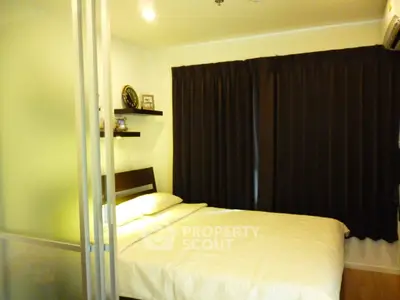 Cozy bedroom with modern decor and soft lighting, perfect for relaxation.
