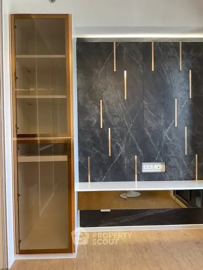 Modern interior with sleek built-in shelving and stylish wall paneling