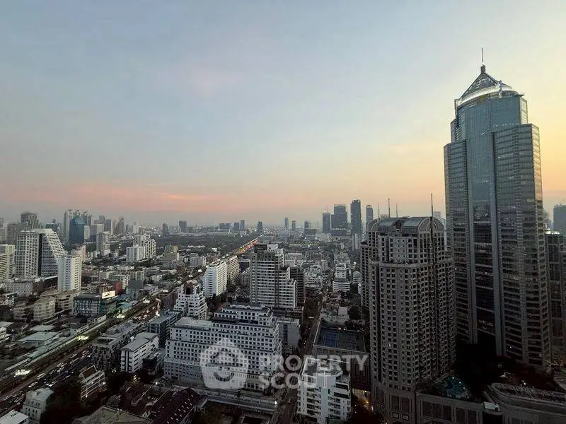 Stunning cityscape view showcasing modern skyscrapers at sunset, perfect for urban living enthusiasts.
