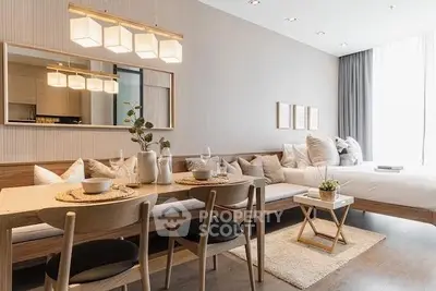 Elegant studio apartment with seamless living and dining area, modern furniture, and tasteful decor, perfect for urban living.