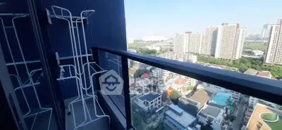 Stunning high-rise balcony with panoramic city view and ample space for relaxation.