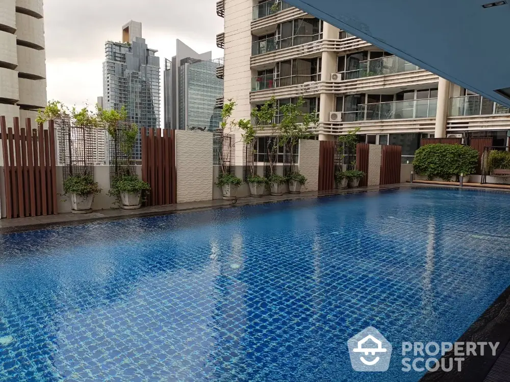 Luxurious condominium with stunning rooftop pool and city skyline view