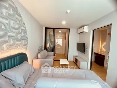 Modern studio apartment with stylish decor and cozy living area