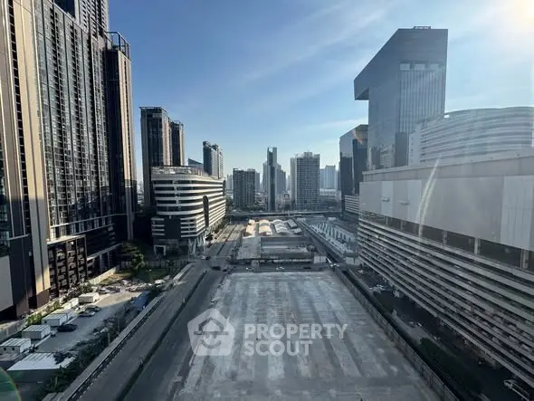 Stunning urban cityscape view with modern skyscrapers and clear blue sky.
