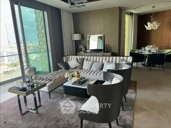Luxurious living room with modern decor and stunning city view, featuring elegant furniture and open dining area.