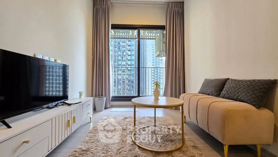 Modern living room with city view, stylish furniture, and large window for natural light.