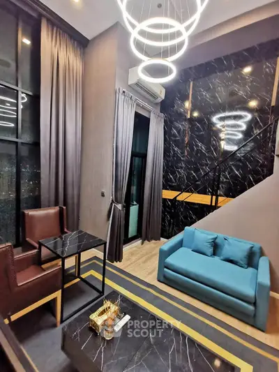 Luxurious modern living room with high ceilings, elegant lighting, and stylish furniture in a sophisticated apartment.