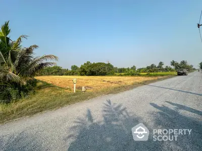 Expansive undeveloped land for sale, offering a blank canvas for a dream property, surrounded by lush greenery and open skies, perfect for a serene rural escape.