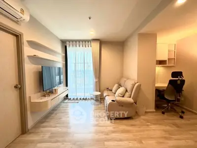 Modern living room with sleek furniture and natural light