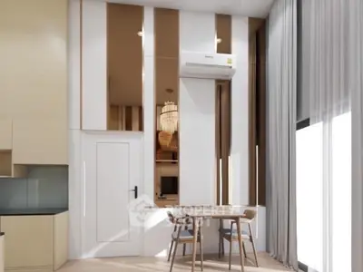 Modern dining area with sleek design and natural light