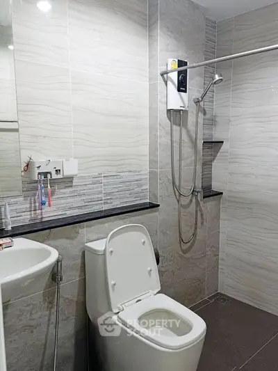 Modern bathroom with sleek design and shower area