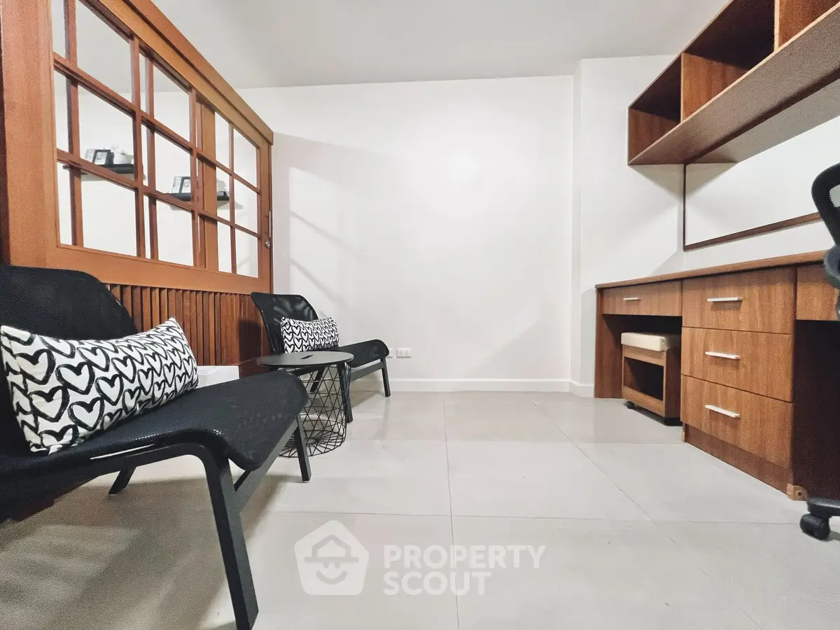 Chic study room with modern furniture and ample storage space