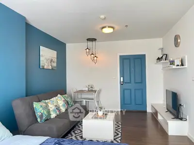Chic living room with modern decor and vibrant blue accents