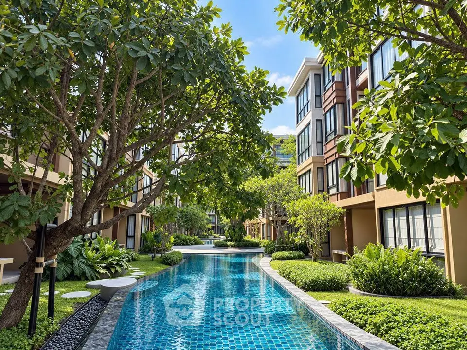 Luxurious residential complex with lush gardens and a sparkling pool, perfect for serene living.