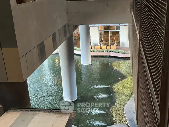 Modern architectural design with water feature in urban building complex