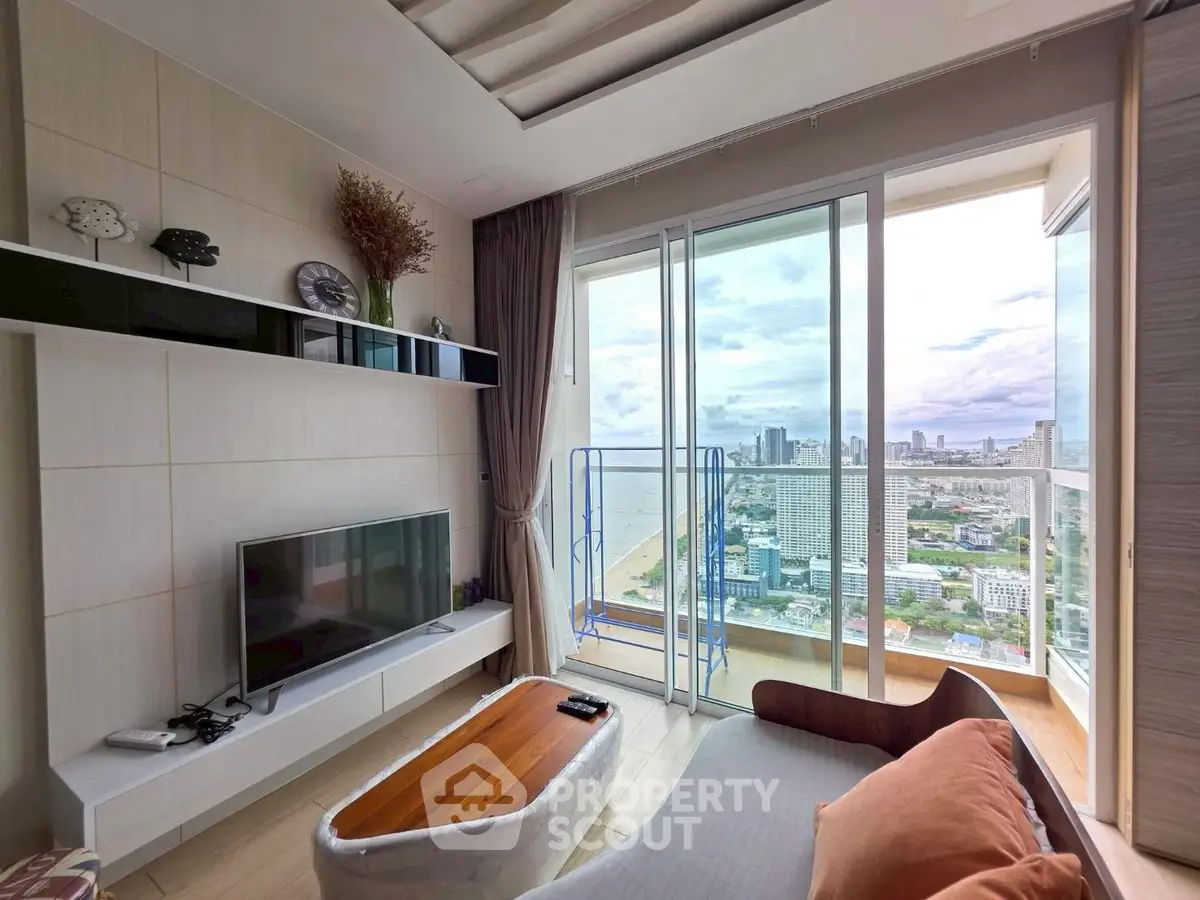 Modern living room with stunning city view and balcony access