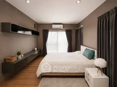 Modern bedroom with sleek design, featuring a cozy bed, stylish storage, and elegant curtains.