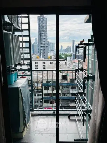 Urban balcony view with city skyline, perfect for enjoying the vibrant cityscape.