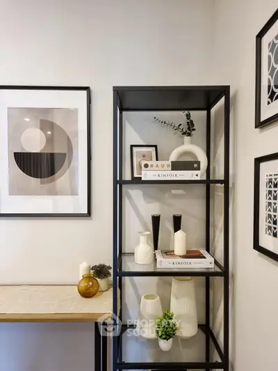 Stylish modern interior with decorative shelving and framed art in a cozy living space.