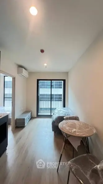 Modern living room with balcony access in a stylish apartment