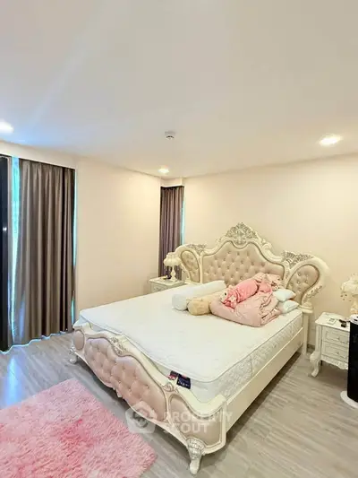 Luxurious bedroom with elegant bed and plush decor in a modern apartment