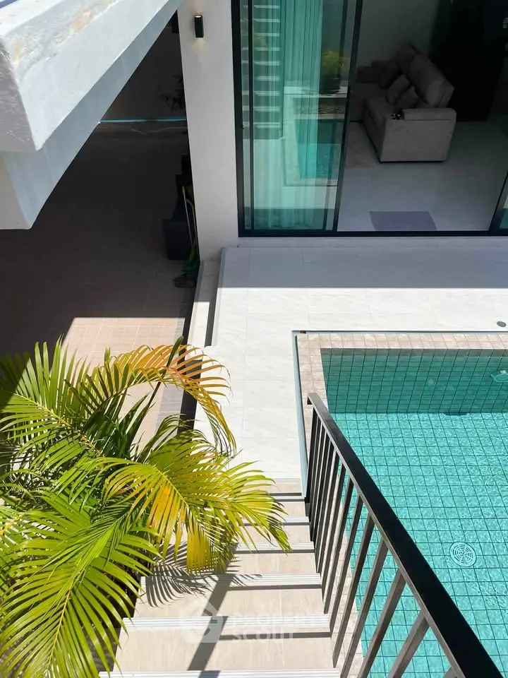 Luxurious modern home with private pool and stylish outdoor area, perfect for relaxation and entertainment.