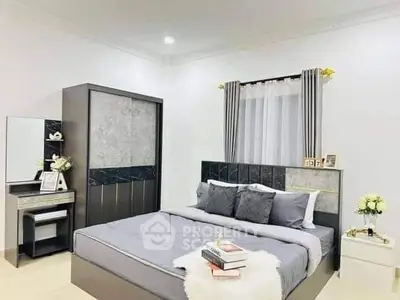 Elegant bedroom with modern furniture and stylish decor