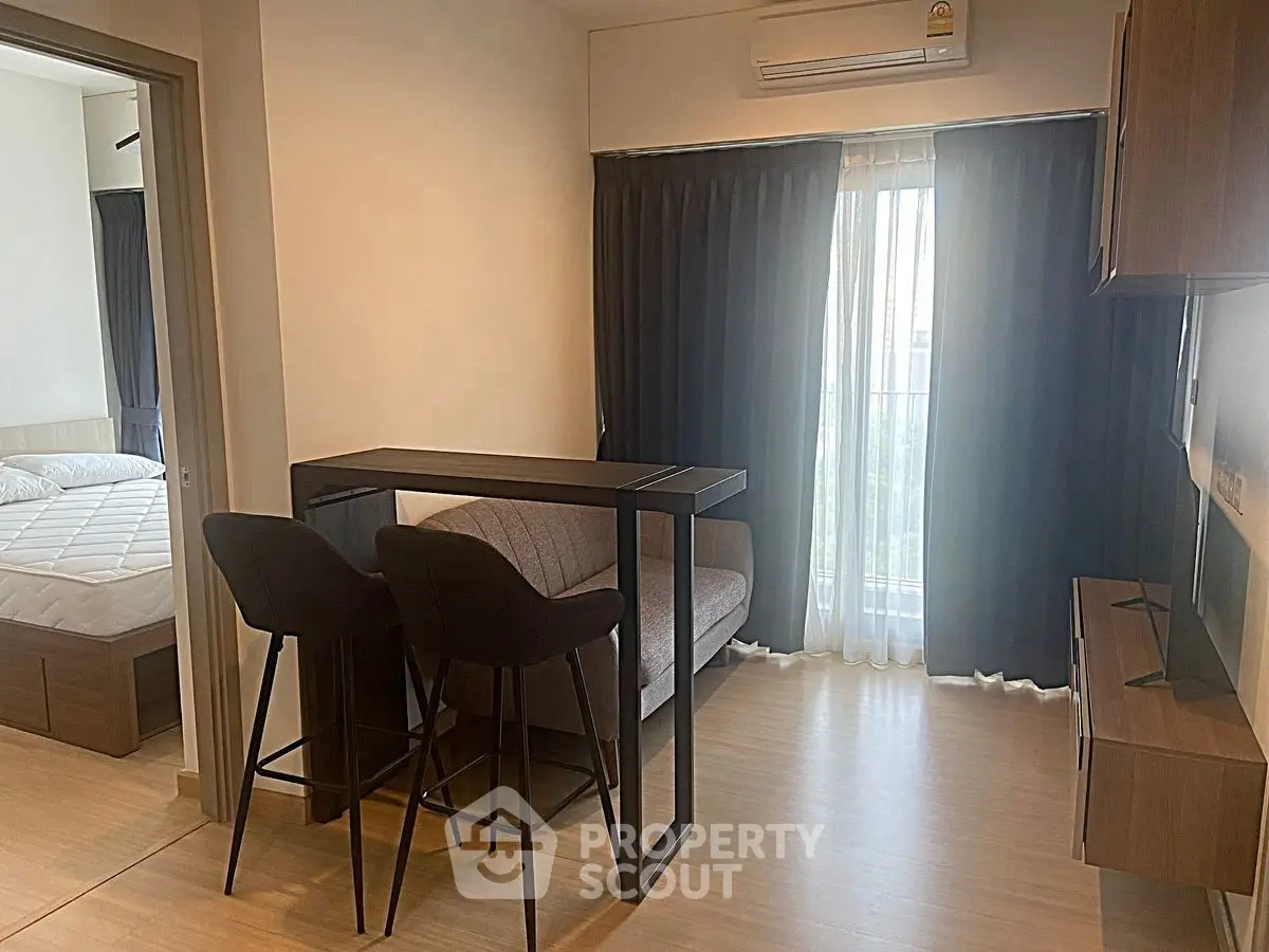 Modern apartment interior with cozy living area and stylish furniture