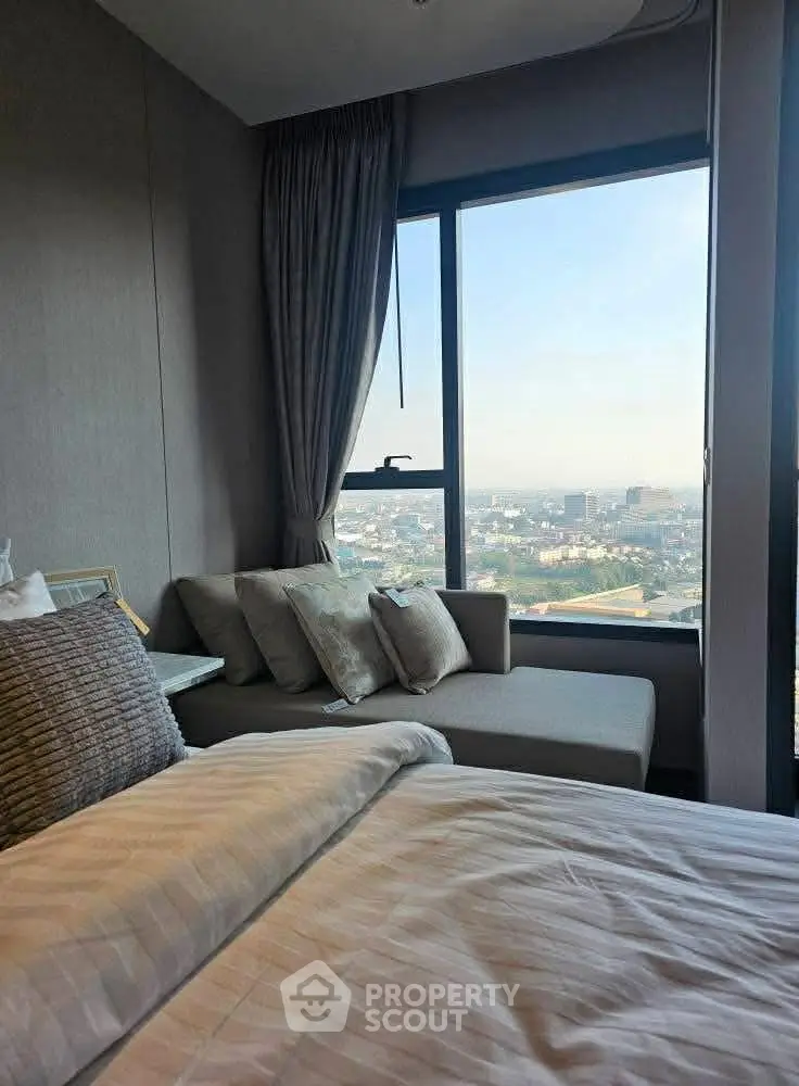 Luxurious bedroom with stunning city view and elegant decor