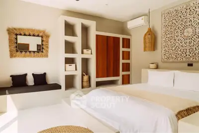 Luxurious bedroom with modern decor, featuring a stylish bed, unique wall art, and built-in storage.
