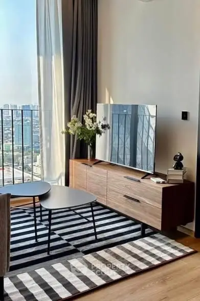 Stylish living room with city view, modern furniture, and elegant decor