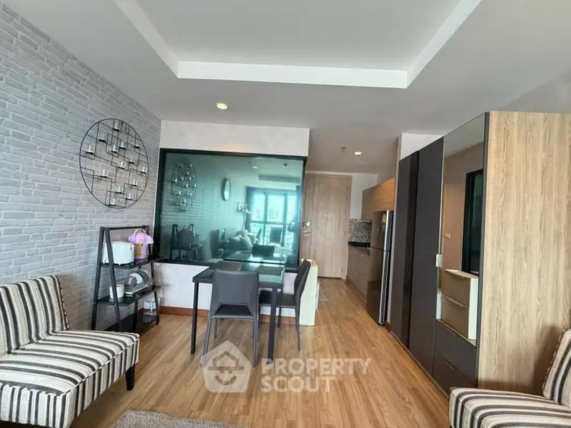 Modern living room with stylish decor and open layout in a contemporary apartment.