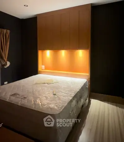 Cozy bedroom with ambient lighting and modern design