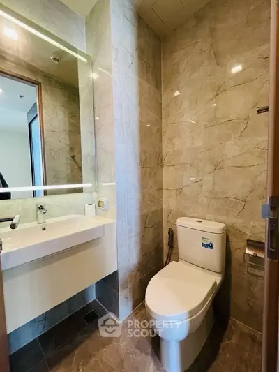 Modern bathroom with sleek design and elegant marble tiles