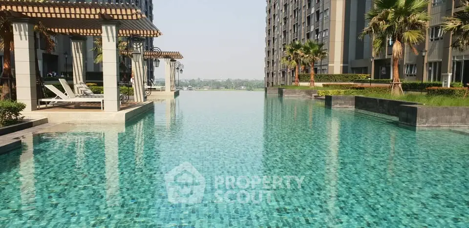 Luxurious infinity pool with stunning cityscape view in modern apartment complex