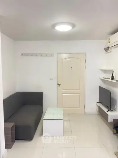 Modern living room with sleek furniture and minimalist design