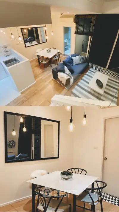 Stylish modern living room with open kitchen and elegant dining area, featuring chic lighting and cozy decor.