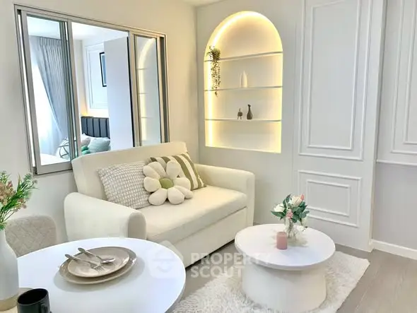 Chic modern living room with cozy white sofa and elegant decor