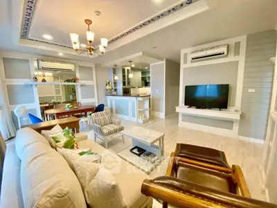 Spacious living room with elegant decor and open kitchen layout