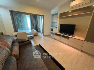 Modern living room with open layout and stylish furniture in a contemporary apartment.