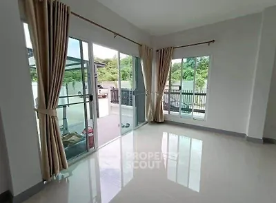 Bright corner unit with large windows and garden view, perfect for natural light lovers.