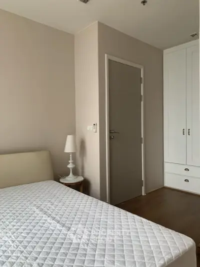 Cozy bedroom with modern decor and ample storage space