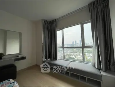 Stunning city view from modern apartment with cozy window seating